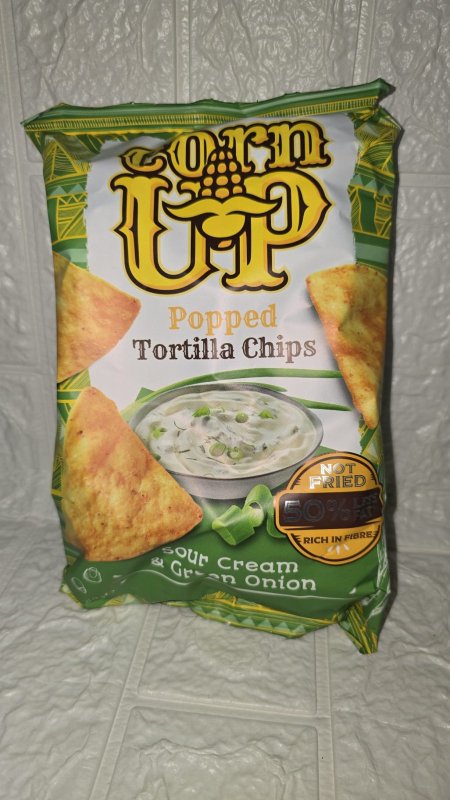 رقائق التورتيلا Corn UP بنكهة الكريمة الحامضة والبصل الأخضر